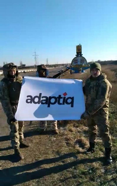 Adaptiq регулярно перераховує частину прибутку для закупівлі необхідного обладнання або оплати рахунків за ремонт автомобілів для захисників України. Компанія допомагає підрозділам, які борються безпосередньо в гарячих точках. У деяких з них воюють близькі співробітників, хтось допомагає конкретним військовим частинам як волонтер. Одним з військових підрозділів, якому допомагає компанія, є 204 окремий батальйон ТРО міста Києва. Adaptiq регулярно співпрацює з благодійним фондом імені його командира роти – Ігоря Черненка. Засновники фонду завжди відкрито розповідають про потреби бійців батальйону, пріоритети закупівель. Крім того, фонд прозоро веде свою бухгалтерію та надає регулярні звіти.
Ще однією з регулярних отримувачів допомоги від Adaptiq є ініціатива "Друже Єгор", яка закриває поточні запити підрозділів 93, 36, 54, 56, 4 бригади ССО, полку "Миротворець" і батальйону "Донбас". Також ініціатива підтримує мешканців прифронтових територій, доставляючи гуманітарну допомогу:  їжу, воду, засоби гігієни, медикаменти.